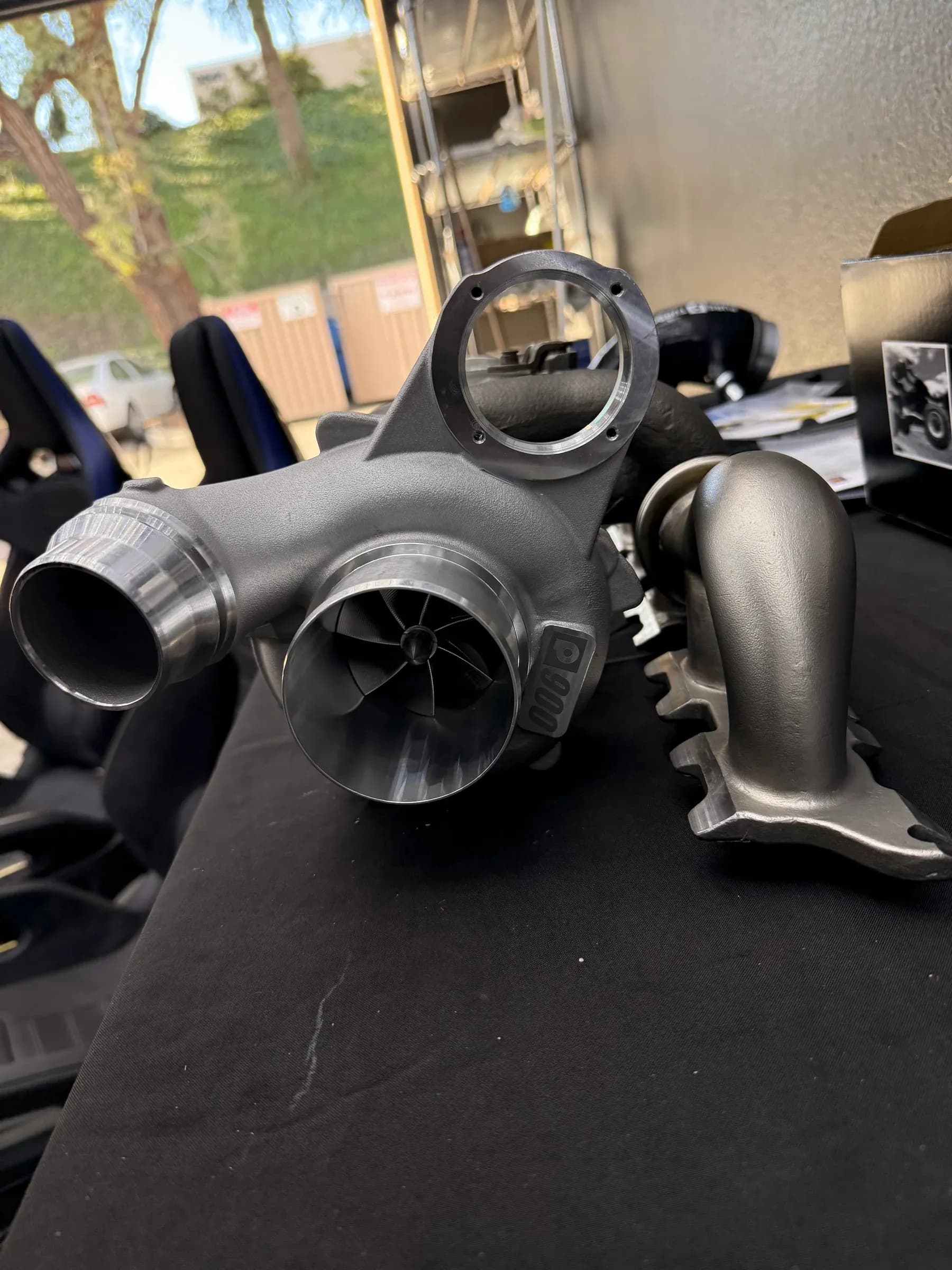 Large turbocharger and performance intake hardware prepared inside the Speedhaus workshop